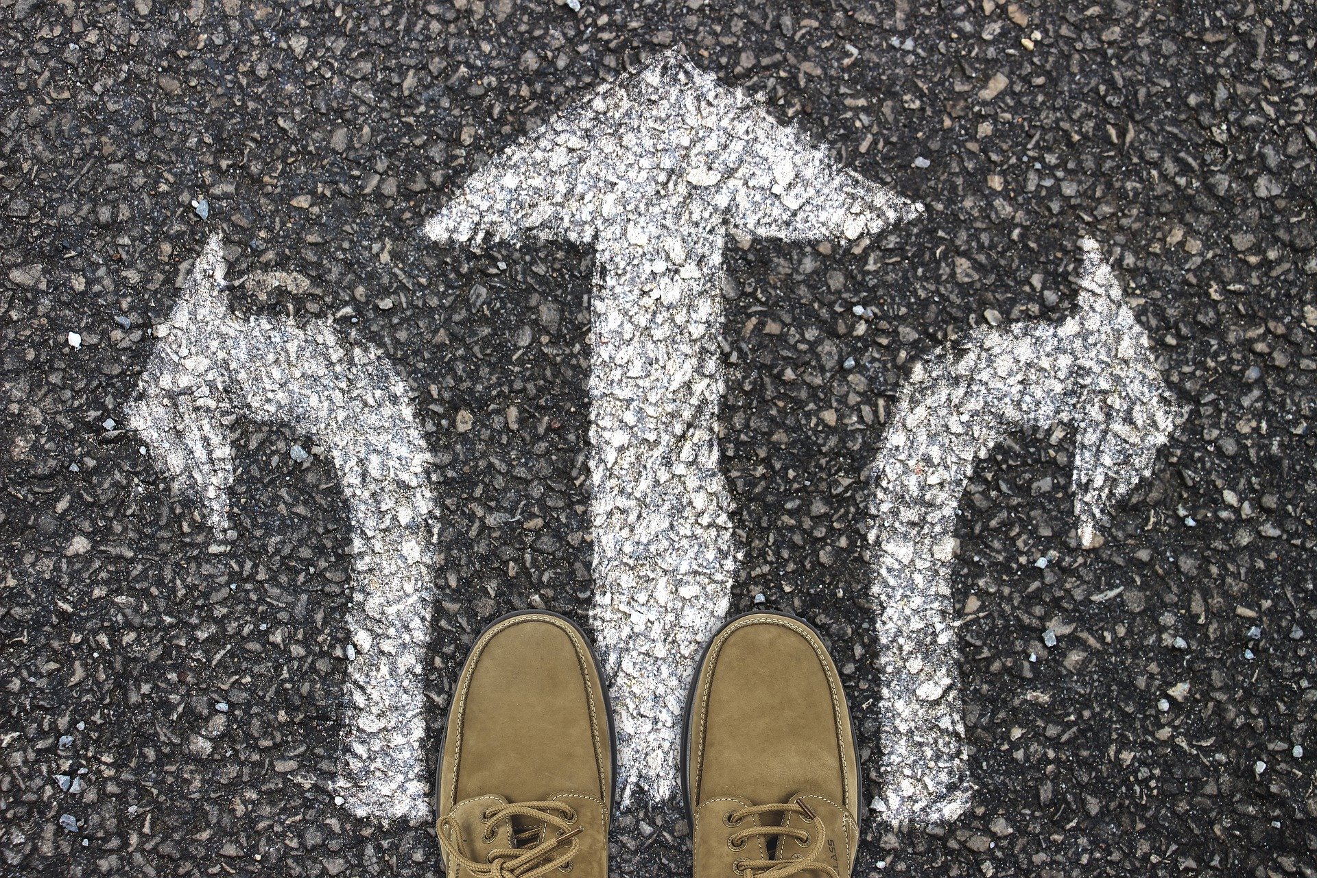 Feet and Direction Sign on concrete